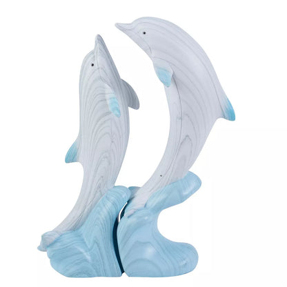 Juego de dos figurillas de delfines con base de ola
